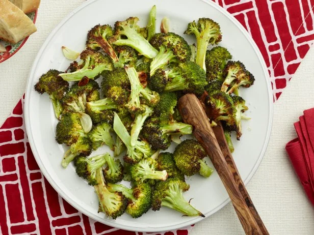 Chef Name: Food Network KitchensFull Recipe Name: Roasted Broccoli with GarlicTalent Recipe: FNK Recipe: Food Network Kitchenâ  s Roasted Broccoli with Garlic, as seen on Food NetworkProject: Foodnetwork.com, Back to School/Sandwich Central/Dinner and a Movie/SidesShow Name: Episode:Food Network / Cooking Channel: Food Network