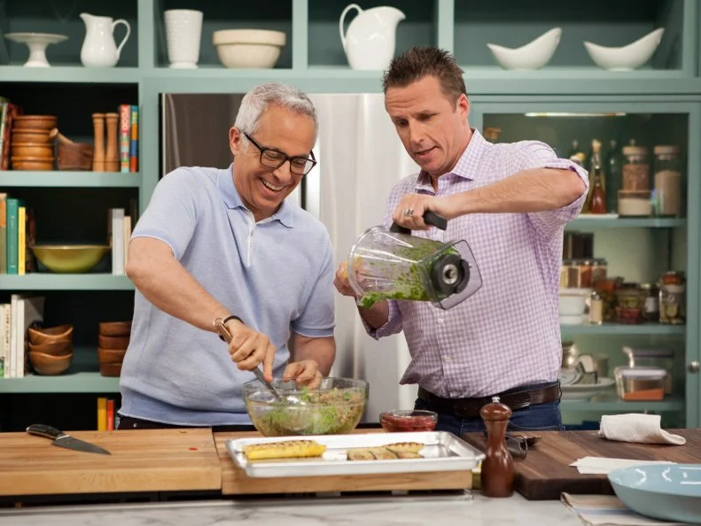 Geoffrey Zakarian, left, prepares a Farro salad as guest Marc Murphy adds pesto, as seen on Food Network's The Kitchen, Season 2.