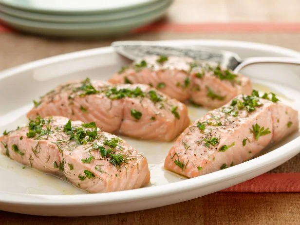 Chef Name: Food Network KitchenFull Recipe Name: Simple Lemon-Herb Roasted SalmonTalent Recipe: FNK Recipe: Food Networks Kitchenâ  s Simple Lemon-Herb Roasted Salmon, as seen on Foodnetwork.comProject: Foodnetwork.com, FN Essentials/Weeknights/Fall/HolidaysShow Name: Food Network / Cooking Channel: Food Network