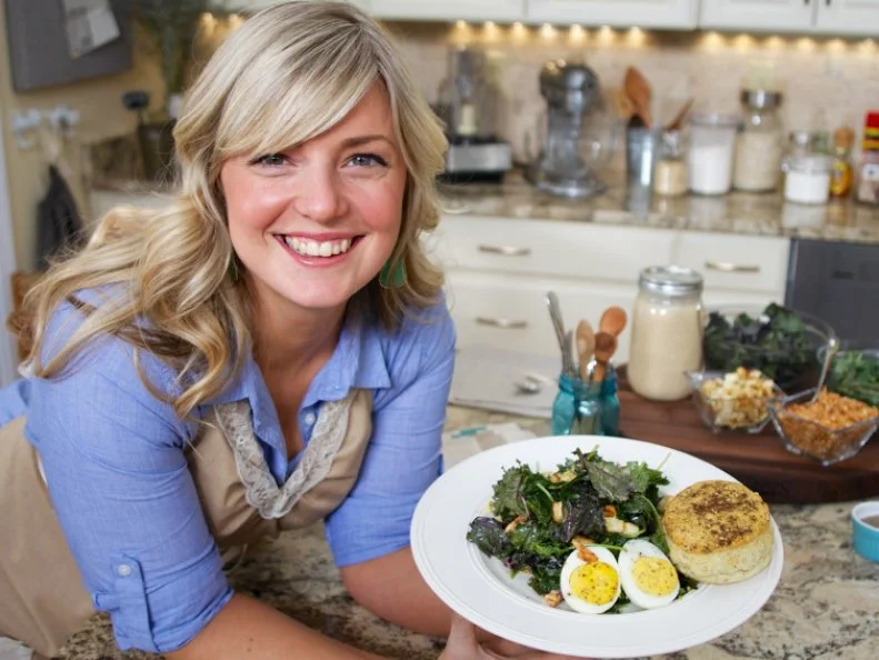 Host Chef Damaris Phillips poses with the final products on the set of Southern at Heart, Big Southern Salad, Season 2.