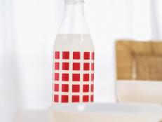 Close-up of a bottle of milk on a breakfast table