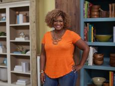 Sunny Anderson poses for a portrait between takes during Food Network's The Kitchen, Season 2.