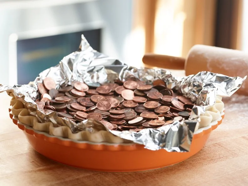 Chef Name: Food Network Kitchen

Full Recipe Name: Pie Crust with Pennies

Talent Recipe: 

FNK Recipe: Food Networks Kitchenâ  s Pie Crust with Pennies, as seen on Foodnetwork.com

Project: Foodnetwork.com, Beat the Clock Dinners / Thanksgiving

Show Name: 

Food Network / Cooking Channel: Food Network