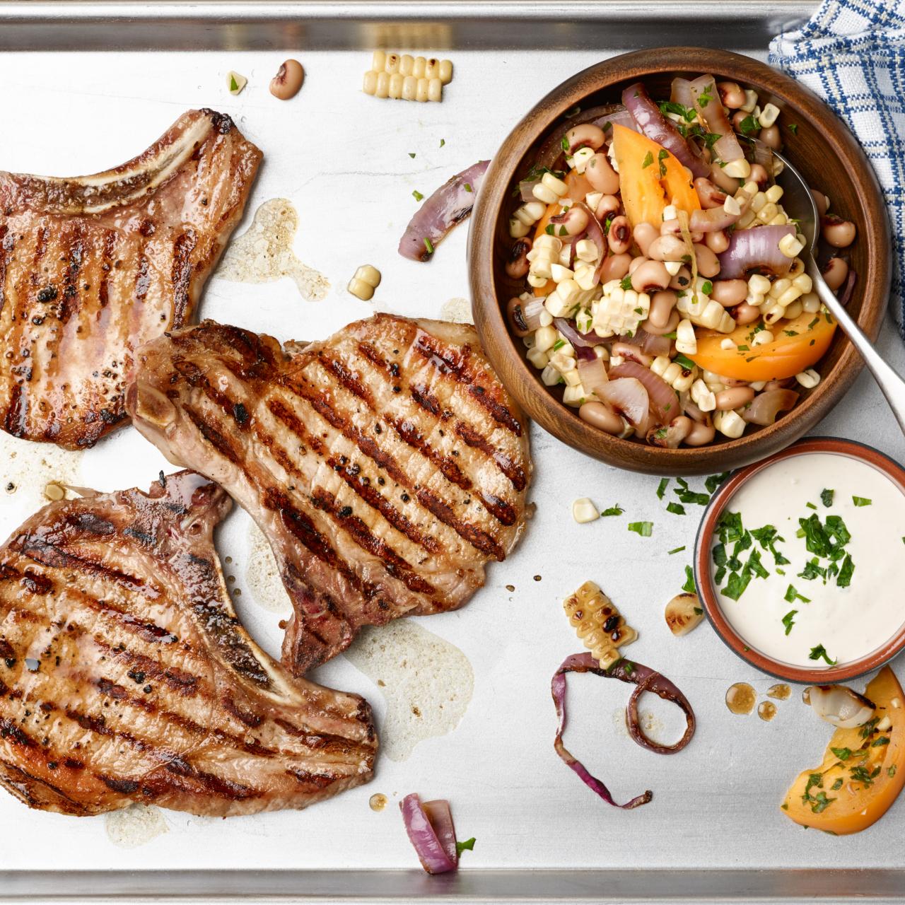 https://food.fnr.sndimg.com/content/dam/images/food/fullset/2014/8/12/1/FN_25-Minute-Grilled-Pork-Chops-with-Succotash_s4x3.jpg.rend.hgtvcom.1280.1280.suffix/1407927075219.jpeg