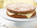 Chef Name: Trisha YearwoodFull Recipe Name: Banana Pudding CakeTalent Recipe: Trisha Yearwoodâ  s Banana Pudding Cake, as seen on Garlic Grits CasseroleFNK Recipe: Project: Foodnetwork.com, HOLIDAY/SUPER BOWL/COMFORT/HEALTHYShow Name: Trishaâ  s Southern KitchenFood Network / Cooking Channel: Food Network