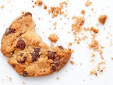Close up of an half eaten cookie with crumb