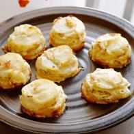 5MINUTEINDIVIDUAL POTATO GRATINSMelissa dâ  ArabianFood Network Star/FN Star FinaleFood NetworkVegetable Spray, Russet Potatoes, Swiss Cheese, Green Onions, Salt, Pepper, Heavy Cream