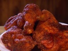 <p>The saying goes that if Colonel Sanders had Uncle Lou's fried chicken recipe, he'd be a general. On The Best Thing I Ever Ate, Guy loved Lou's "crazy" fried chicken that's dipped into a sauce once called "Corruption." Now, thanks to Guy, it has been rechristened Sweet Spicy Love.</p>