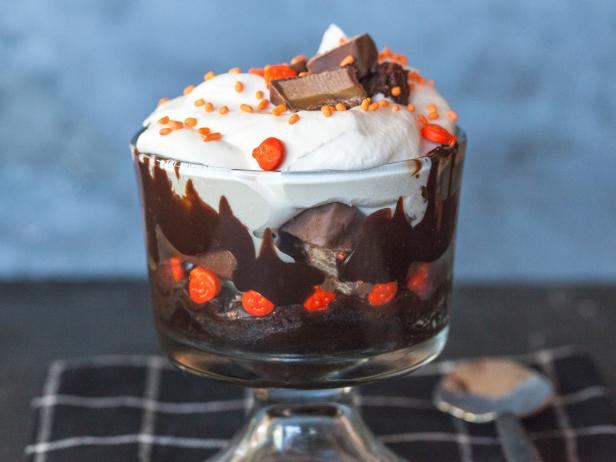 Brownie Trifle decorated with mini candy bars, and jack-o-lantern sprinkles,