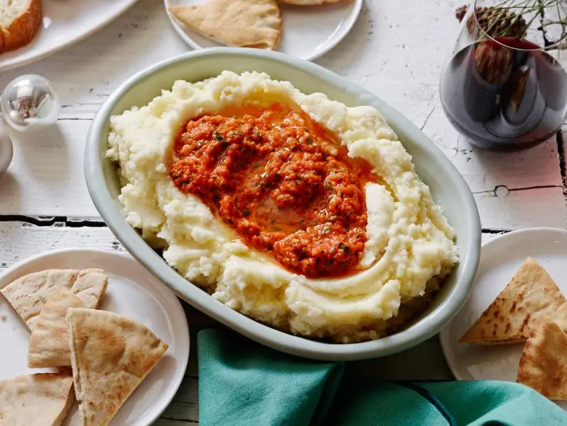 CREAMY POTATO AND ROASTED RED PEPPER DIP
Food Network Kitchen
Food Network
Russet Potatoes, Kosher Salt, Garlic, Almonds, Olive Oil, Roasted Red Peppers, Flatleaf
Parsley, Red Pepper Flakes, Lemon Juice, White Wine Vinegar