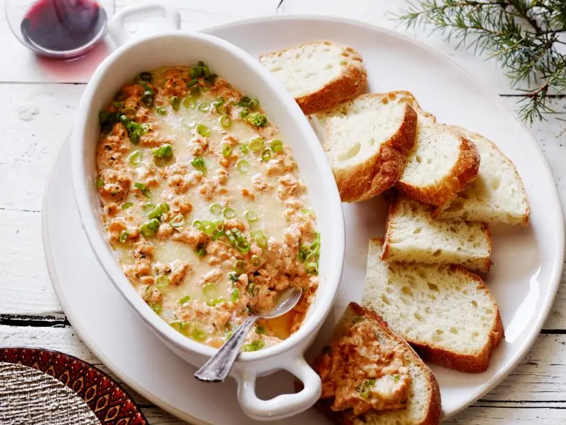 NEW ORLEANS BARBECUE SHRIMP DIP
Food Network Kitchen
Food Network
Butter, Chili Sauce, Lemon Juice, Garlic, Worcestershire Sauce, Cayenne, Oregano, Paprika,
Hot Sauce, Shrimp, Cream Cheese, Scallions, Sour Cream, Parsley, Kosher Salt, Black Pepper