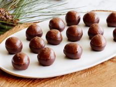 Inspired by buckeye candies, these chocolate-hazelnut treats get a light and crunchy texture from finely ground toasted rice cereal.