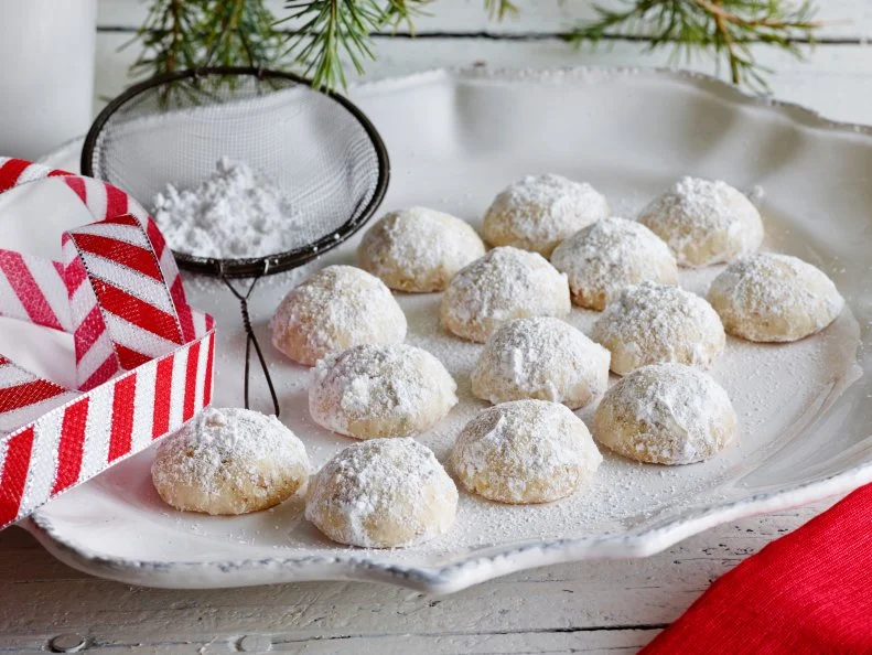 POLVORONES (MEXICAN WEDDING COOKIES)Marcela ValladolidFood NetworkWalnuts, Fine Salt, Butter, Sugar, Flour, Confectionersâ   Sugar, Cinnamon