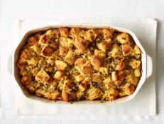 You'll want to try each and every one of these comforting Thanksgiving stuffing recipes, even if there's room for only one on your dining room table.