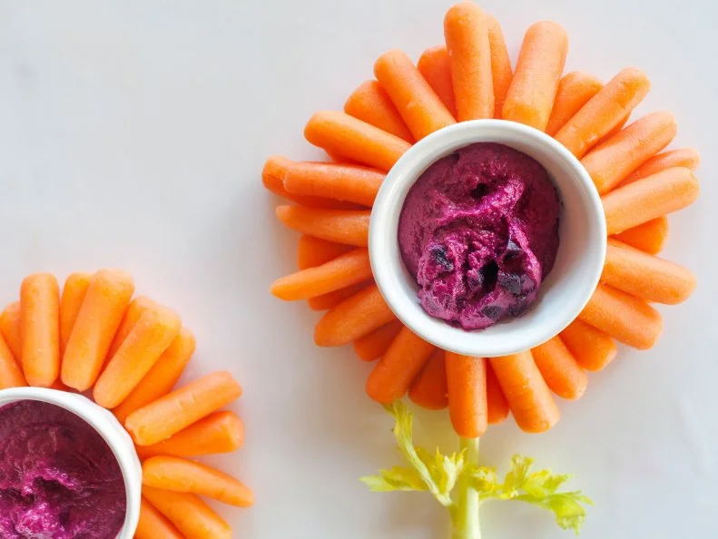 carrot flower with beet hummus dip