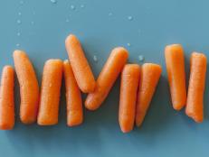 Opening photograph of fresh baby carrots