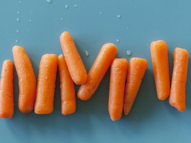 Opening photograph of fresh baby carrots