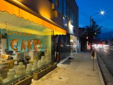 An exterior view of Charm City Cakes at dusk, as seen on Food Networkâ  s Duff Till Dawn, Season 1.