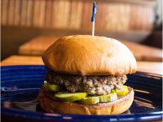 Visit The Blue Door Pub to find out why Guy said, "I'd like to float on that burger to Flavortown!" Try the signature stuffed burger made with blue cheese and garlic, known as the Blucy, or go bold and sample more-unusual offerings, like the burger topped with red currant jelly.