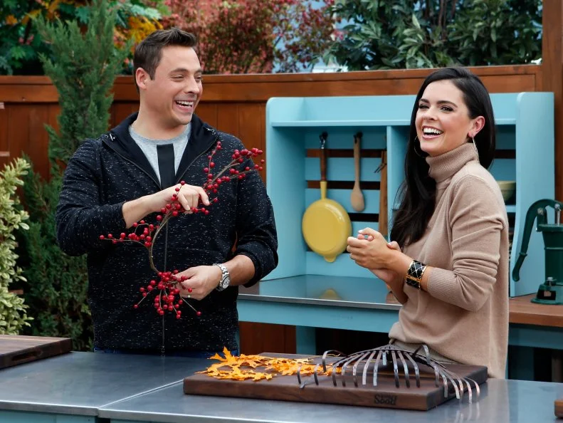 Hosts Jeff Mauro and Katie Lee discuss how to create a fall wreath using an old rake as seen on Food Network's The Kitchen, Season 7.