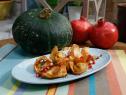 Ming Tsai's Kabocha Squash and Shiitake Wontons with Pomegranate-Vinegar Syrup are seen on the set of Food Network's The Kitchen, Season 7.