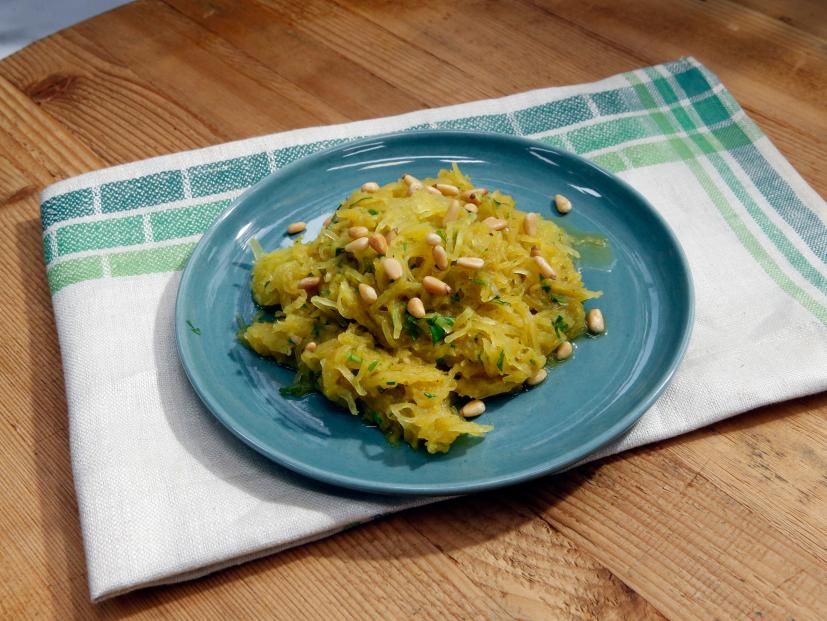 Katie Lee's Roasted Spaghetti Squash with Curry-Shallot Butter dish as seen on Food Network's The Kitchen, Season 7.