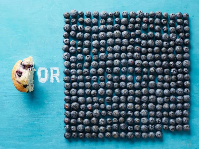250 Calories worth of Blueberries or a Blueberry Muffin.
