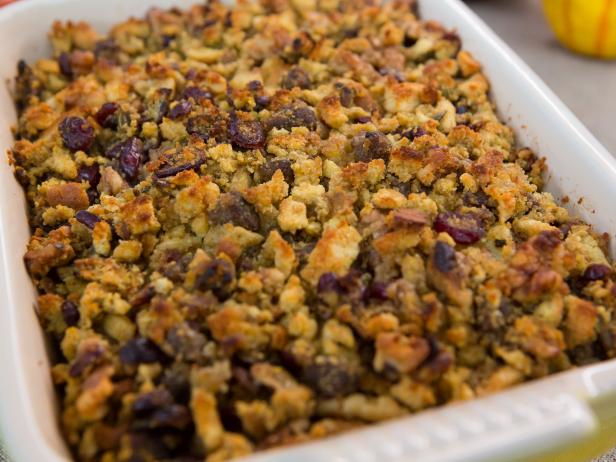 Host, Valerie Bertinelli's Cranberry Walnut Stuffing fresh out of the oven during a Thanksgiving celebration dinner, as seen on Food Network’s Valerie’s Home Cooking, Season 2
