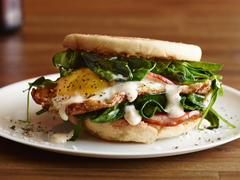 FNK HANGOVER EASY EGGS BENEDICT SANDWICH Food Network Kitchen Food Network Mayonnaise, Lemon Juice, Cayenne, Canadian Bacon, English Muffin, Unsalted Butter, Baby Spinach, Egg