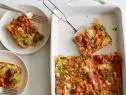 FNK SPAGHETTI AND MEATBALL CASSEROLE Food Network Kitchen Food Network Spaghetti, White Bread, Milk, Ground Beef, Ground Pork, Eggs, Parmesan, Garlic, Mozzarella, Sundried Tomatoes, Marinara Sauce, Parsley