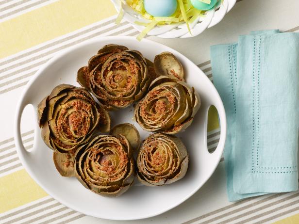 Food Network Kitchen’s Slow Cooker Braised Artichokes with Toasted Garlic Breadcrumbs from Slow-Cooker Recipes for Easter for KIDS CAN BAKE/KIDS CAN MAKE/EASTER, as seen on Food Network.