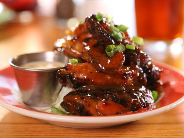 Banana-Garlic Chicken Wings with Tropical Creme Dipping Sauce and Sweet Plantains image