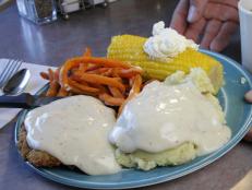 Though it&rsquo;s named the House of Pies, diners don&rsquo;t head here just for dessert; the Country Fried Steak is a must-try main dish at this spot. The steak is dipped in a buttermilk bath, coated in flour and deep-fried until it turns golden brown. A creamy gravy completes this indulgent creation.
