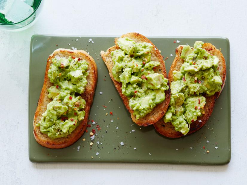 FNK AVOCADO TOAST Food Network Kitchen Food Network Avocados, Whole Grain Bread, Garlic, Olive Oil, Sea Salt, Red Pepper Flake