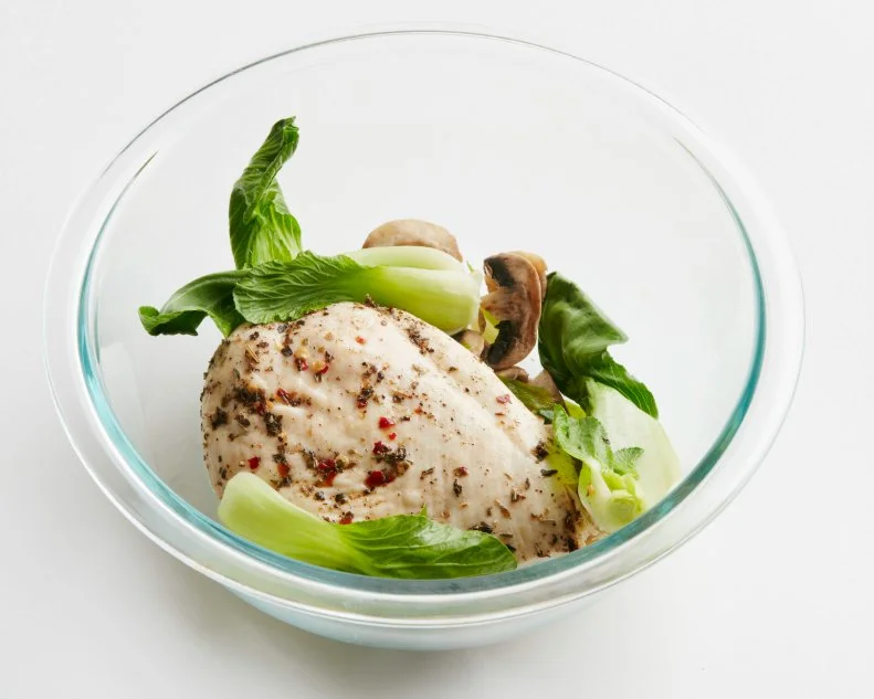 FNK 15 MICROWAVE TRICKS DINNER FOR ONE Food Network Kitchen Food Network Microwave, Oil, Mushrooms, Scallions, Bok Choy, Broccoli, String Beans, Salmon, Chicken Breast