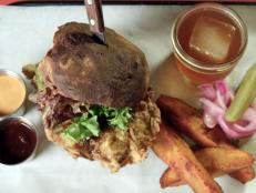 This spot may be called The People&rsquo;s Pig, but it&rsquo;s the smoked fried chicken sandwich that has the locals hooked. Owner Cliff Allen brings bold flavors to this sandwich by smoking the chicken thighs over white oak wood before dipping them in a buttery batter and frying them to create a golden crust.