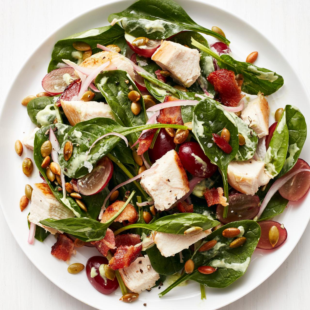 https://food.fnr.sndimg.com/content/dam/images/food/fullset/2015/12/16/3/FNM_010116-Spinach-Bacon-Salad-with-Chicken-Recipe_s4x3.jpg.rend.hgtvcom.1280.1280.suffix/1450719022205.jpeg