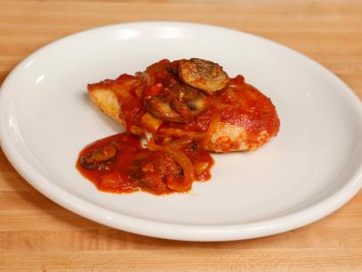 Host Anne Burrell's Chicken Cacciatore dish is seen before the "Family Food" competition as seen on Food Network's Worst Cooks in America, Season 8, Episode 2.