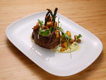 Host Tyler Florence's Filet Oscar with BŽarnaise and Rosemary Potatoes dish is seen on the set of Food Network's Worst Cooks in America, Season 8.