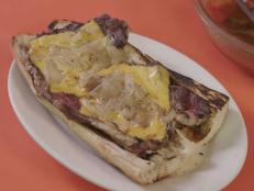 Stop by this old-school Hoboken joint to listen to some Sinatra on the jukebox while savoring classic sandwiches. A must-try is the cheesesteak: a grilled slab of marbled rib eye is topped with melty American cheese and caramelized onions, then piled onto a sliced hunk of bread from a local bakery.