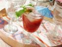Detail of Host Giada de Laurentiis' drink, Strawberry Basil Agua Fresca, as seen on Food Network’s Giada Entertains, Season 1.
