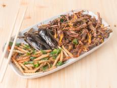 Mix insect fried on wooden background 