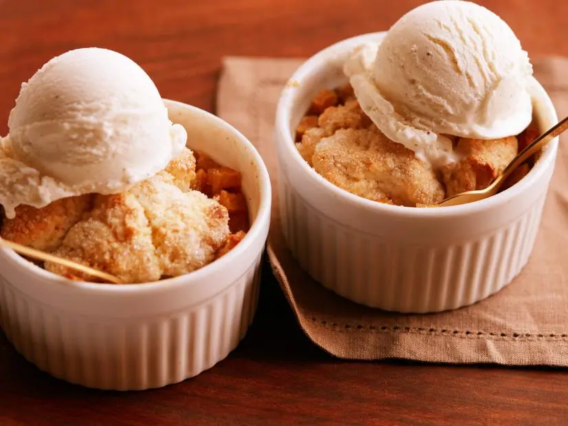 FNK APPLE COBBLER FOR TWO Food Network Kitchen Food Network Apples, Sugar, Allpurpose Flour, Cinnamon, Nutmeg, Butter, Baking Powder, Fine Salt, Heavy Cream, Vanilla Ice Cream