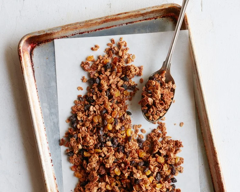FNK OATMEAL RAISIN COOKIE GRANOLA Food Network Kitchen Food Network Unsalted Butter, Light Brown Sugar, Maple Syrup, Vanilla Extract, Cinnamon, Nutmeg, Rolled Oats, Raisins, Golden Raisins