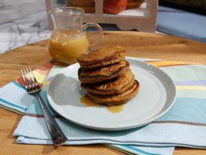Geoffrey Zakarian's Eggnog Syrup and Jeff Mauro's Gingerbread Cookie Pancakes are seen on the set of Food Network's The Kitchen, Season 8.