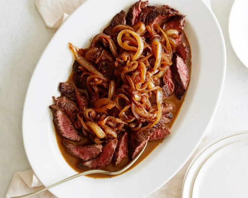 FRENCH CUT STEAK Melissa d’Arabian Ten Dollar Dinners/Steak Dinner Food Network Paprika, Onion Powder, Garlic Powder, Skirt Steak, Vegetable Oil, Butter, Sweet Onions, White Wine, Beef Stock or Broth, Red Wine Vinegar