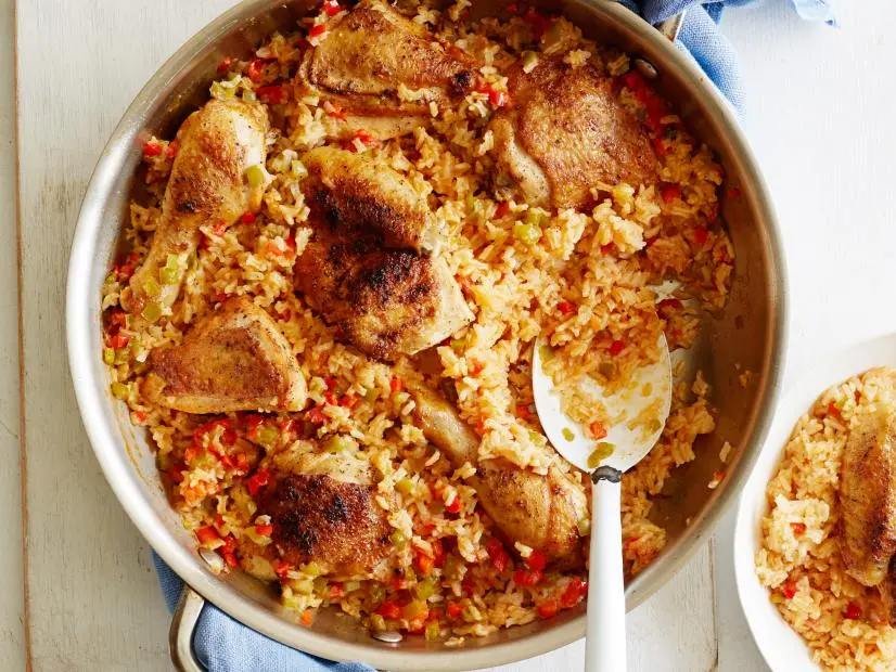 ARROZ CON POLLO Melissa d’Arabian Ten Dollar Dinners/Back in Tucson Food Network Garlic Powder, Cumin, Cayenne Pepper, Yellow Onion, Chicken, Vegetable Oil, Green Bell Pepper, Red Bell Pepper, Salt, Longgrain Rice, Garlic, Chicken Stock, Tomato Sauce