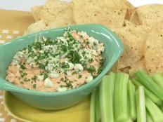 This party dip usually comes with bragging rights for an indulgent amount of fat. Our slow-cooker version is full of the same big flavors, but with fewer calories and less fat.