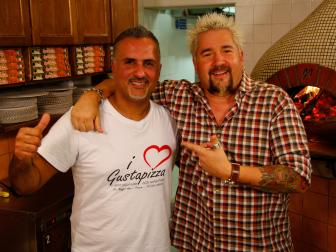 Portrait shot of Guy Fieri and chef/owner Pasquale Maruca of Il Gusta Pizza in Florence, Italy as seen on Diners, Drive-Ins and Dives episode DV2203.