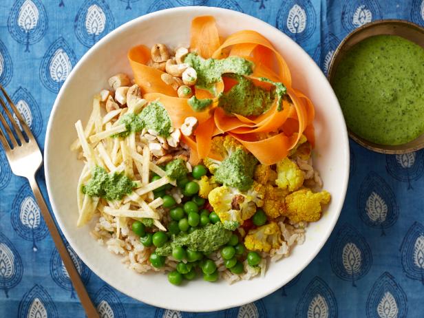 Food Network Kitchen’s brown rice bowl with curried roasted cauliflower and green chutney as seen on Food Network.
